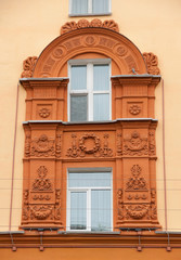 Facade framing window of old brick house, Smolensk, Russia