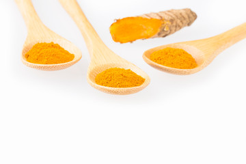 Turmeric powder and fresh turmeric - Curcuma longa.