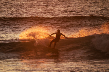 Surf boy athlete train and enjoy the power of the nature on the ocean waves do tricks. Youthful and happiness for alternative sport and lifestyle concept. Milennial people have fun