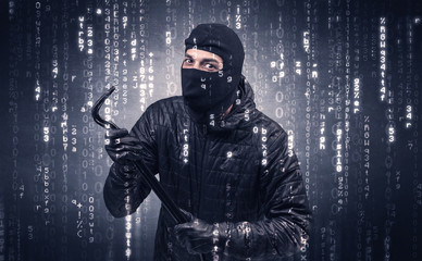 Burglar in action with encoded concept and his tools in his hand. 