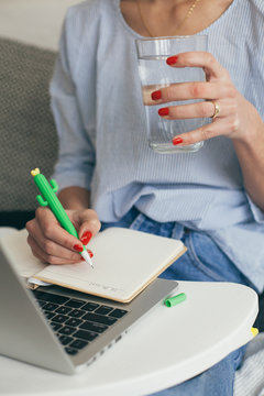 Woman using laptop indoor