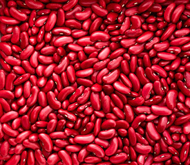 Red haricot kidney beans background texture, flat lay, top view, copy space. Vegetarian and vegan protein food concept