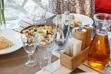 Cheese variety, honey, olive oil and cracker biscuits