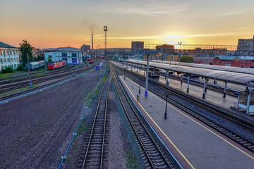 Fototapeta na wymiar Top view of the railway station of the sunset