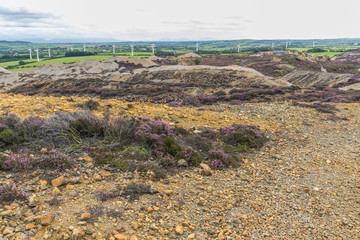 Parys Mountain, unearthly landscape like another planet, with wind turbines.
