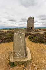 Trig post and derelict stone windmill, Parys Mountain.
