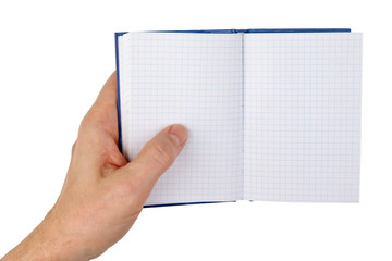 An old man holds in his hand an open notebook with empty checked pages. Isolated