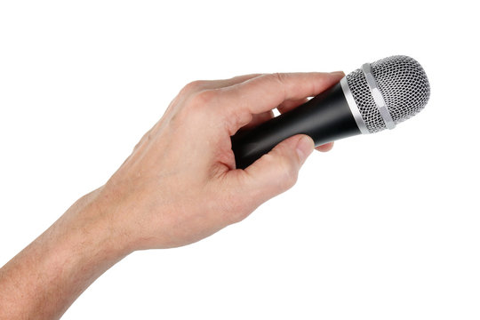 Elderly male singer holds silver  vocal dinamic  microphone in his hand. Isolated