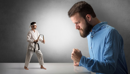 Giant hipster man yelling at a small karate man
