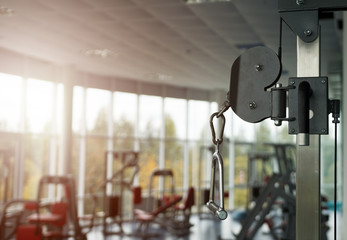 Blurred empty gym interior with equipment