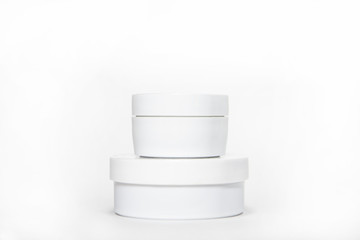 blank mock up advertising with copy space of the white jars isolated on the white background
