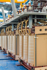 Internal active parts (core and coils) of transformer in production