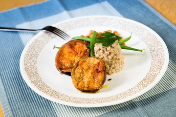 Fried breaded aubergine and barley pearl.