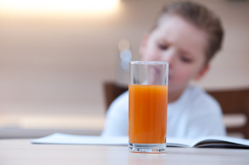 Cute boy in white T-shirt paint coloring