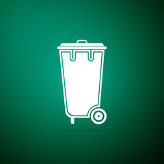 Recycle bin with icon isolated on green background. Trash can icon. Flat design. Vector Illustration