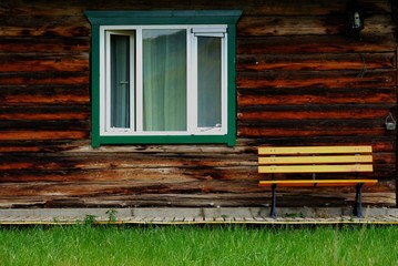 Bench in front of log home decorative style hostel