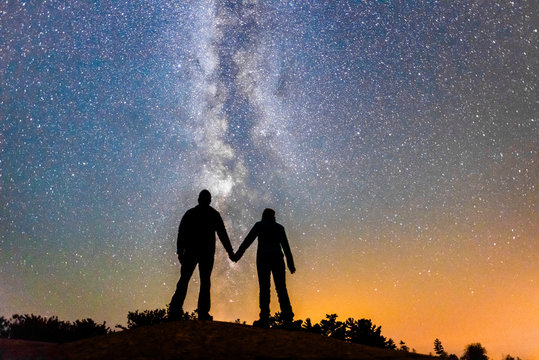 Silhouette of Couple Holding Hands With Milky Way Galaxy Night Stars