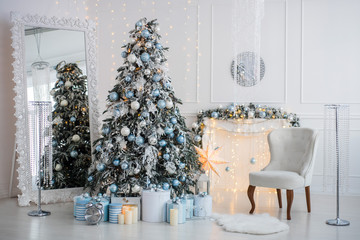 Christmas tree with presents and decorations in the room or studio