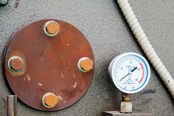 Metal parts and pressure gauge
