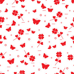 Seamless pattern with shamrock and butterflies.