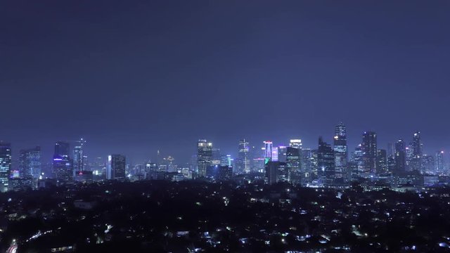 TIMELAPSE Jakarta Downtown Skyline with High-Rise Buildings at Night, Indonesia, Asia