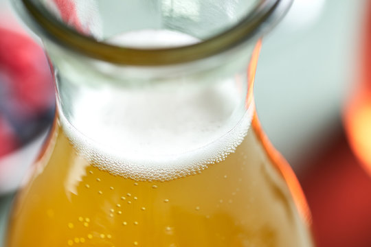 Close-up of fermented tea in bottle.
