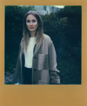 Polaroid scan of young woman with gold frame