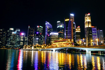 Naklejka na ściany i meble Singapore night view from Esplanade bridge 