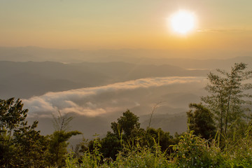 Fog and sun Morning after mountain at Phu Soi Dao National Park, Uttaradit in Thailand.