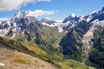 Fototapeta na wymiar Closeup mountains scenes in national park Dombai, Caucasus, Russia
