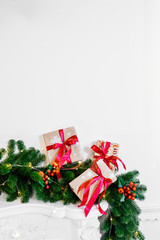Beautiful Christmas room with decorateв, gifts on white fireplace. The idea for postcards. Place for text. Isolated