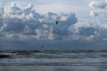 Jumping Kitesurfing and clouds