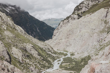 Fototapeta na wymiar View closeup river scenes in mountains, national park Switzerland