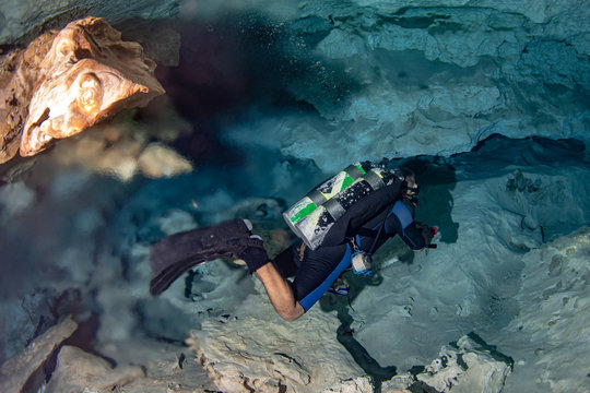 halocline effect while diving in cenotes cave in Mexico
