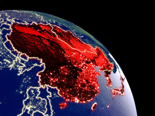 East Asia at night from orbit. Plastic planet surface with visible city lights.