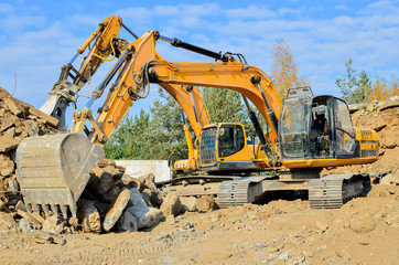 Excavator in working in a quarry. Excavator bucket Heavy equipment preparers construction job site. Digging bucket. bulldozer