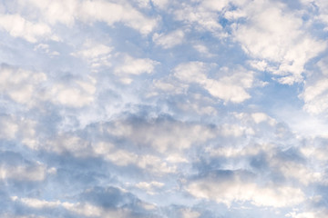 Beautiful cloudy sky in sunset with God light message. Space for text.