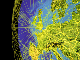 Western Europe from space on planet Earth with lines representing global communication, travel, connections.