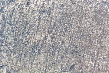 The texture of an old gray processed stone_