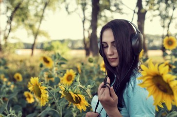Summer walk in the countryside with a girl