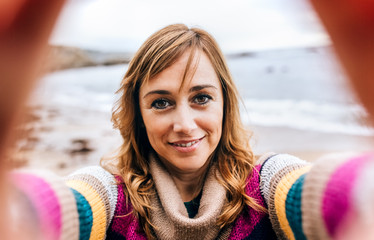 Middle-aged woman making a selfie