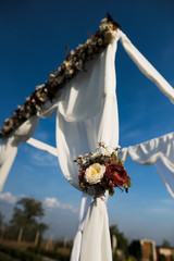 Wedding arch decoration for engagement ceremony in sunny day
