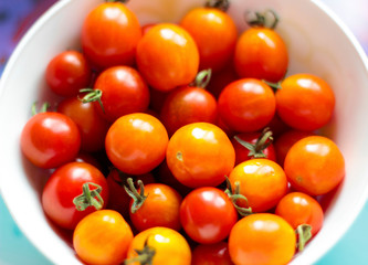 Lots of red cherry tomato in a Cup