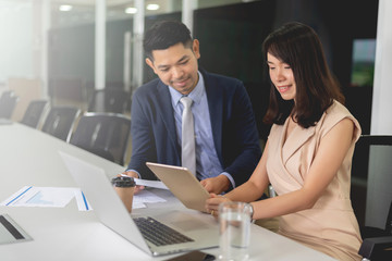 Business man and woman discussion in the office