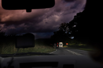 View from the car window in the late evening on the road in Wales