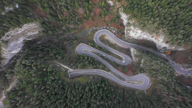 Aerial view of a winding forest road in Bicaz Gorge Transylvania Romania
