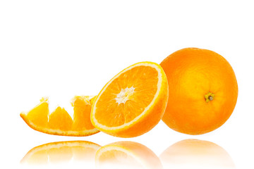 Orange with half isolated on the white background, with mirror reflection on surface