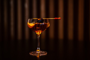 Coctail with Black Olive on the Stick