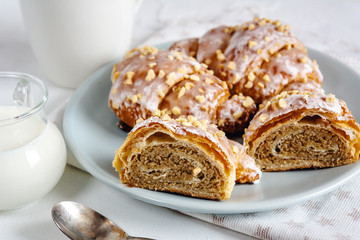 Polish traditional Saint Martin's croissants.Traditional pastries with white poppy seeds and nuts. - obrazy, fototapety, plakaty