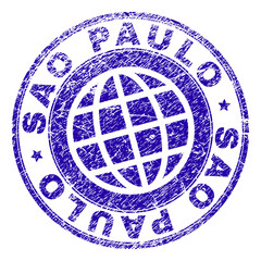 SAO PAULO stamp imprint with grunge texture. Blue vector rubber seal imprint of SAO PAULO tag with corroded texture. Seal has words arranged by circle and globe symbol.